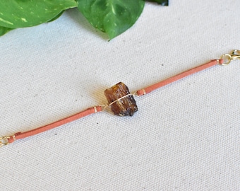 Amber bracelet - 14 k gold wire. Fluorescent and semi translucent. Orange/yellow amber from Sumatra, Indonesia. Natural and rough