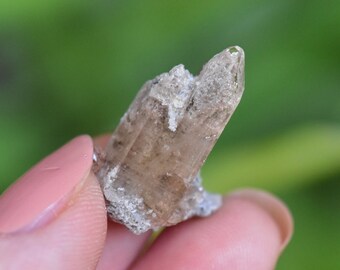 Imperial Topaz, Bixbyite, and Rhyolite crystal cluster from Utah.