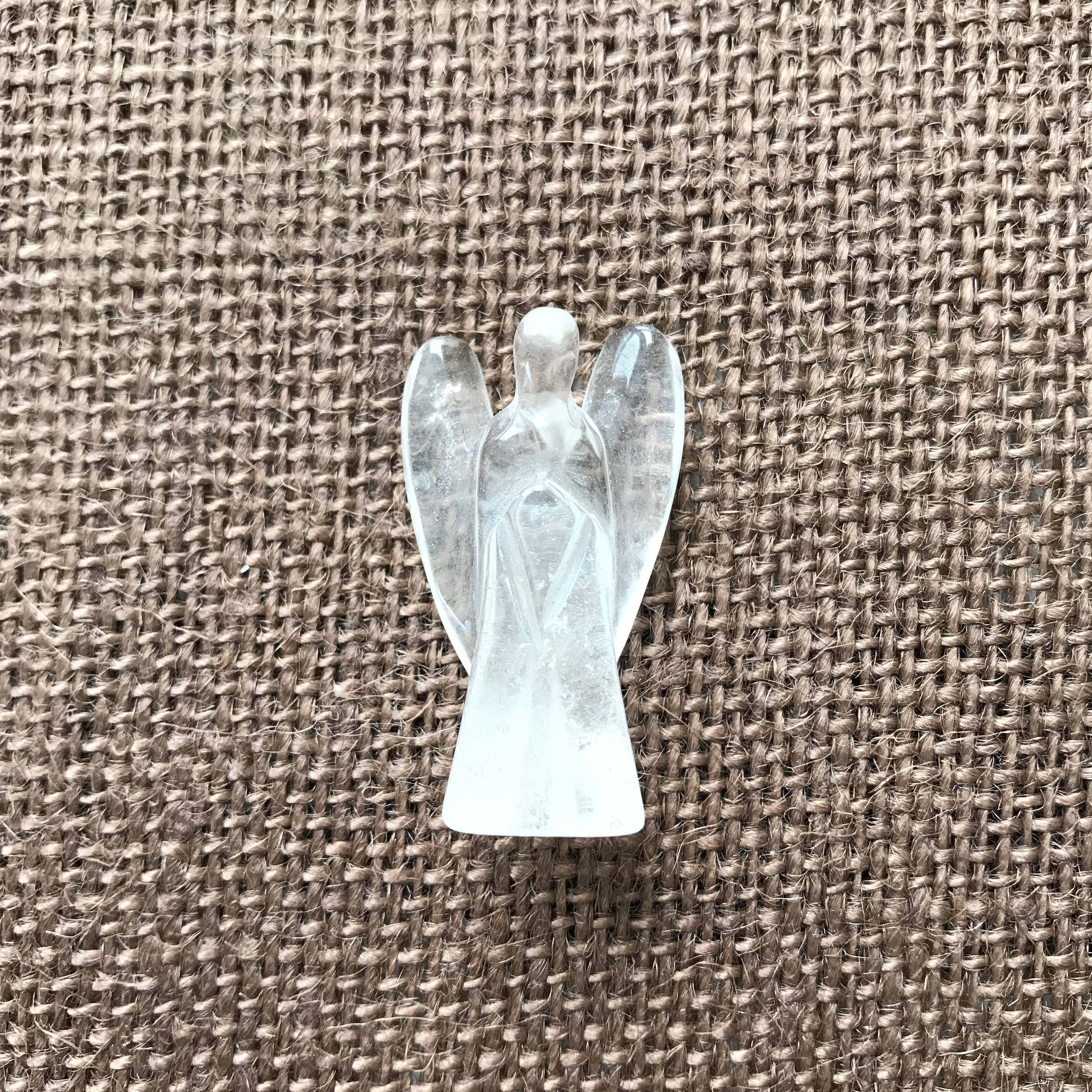 Quartz crystal angel figurine. Hand carved in Brazil. Protection and