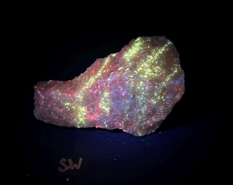 Fluorescent Chondrodite and Diopside on Calcite with Pyrite. Shortwave and Midwave UV. Long Lake Zinc Mine, Canada