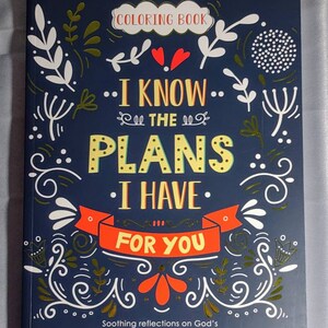 May include: A blue coloring book with gold and red accents. The cover features the text "I know the plans I have for you." and "Soothing reflections on God's perfect plan and purpose for your life."
