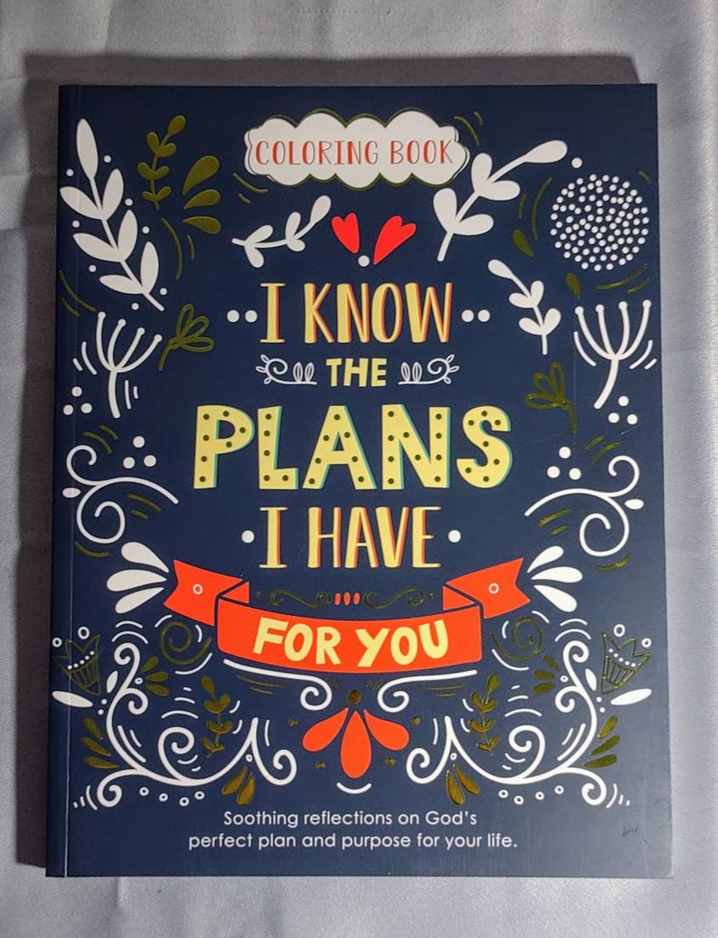 May include: A blue coloring book with gold and red accents. The cover features the text "I know the plans I have for you." and "Soothing reflections on God's perfect plan and purpose for your life."