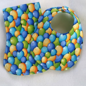 Colorful Bid and Burp Cloth of Balloons for your little one.