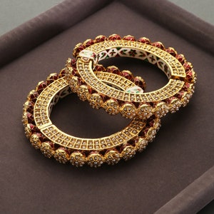 Preeta Gold Plated Punjabi Jadau Pearl Pacheli Bangles - Set of 2/ Gold Tone Jadau Bangle/ Punjabi Jadau White Pearl Bangle Set.