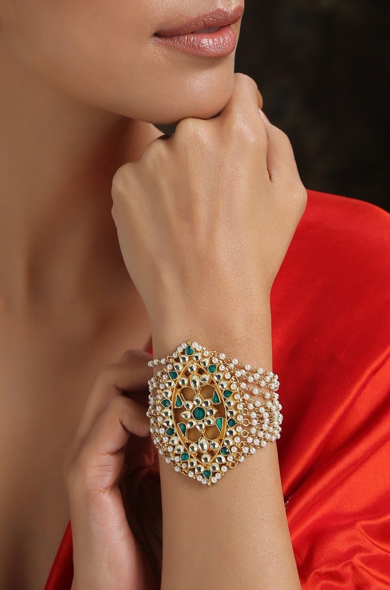 Buy Women's Set Of 2 Gold-Plated Kundan Studded Off-White Bead Drop Bangles  online at Trendia