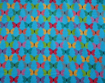 Fabric - Multicolored Butterflies on Blue Background