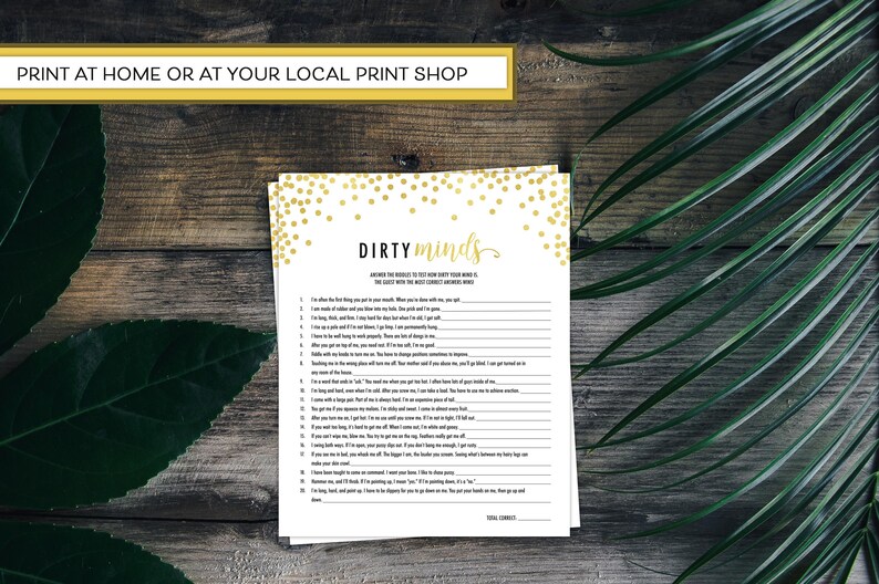 May include: A printable game card with a white background and gold confetti. The card has the title "Dirty Minds" and asks players to answer the questions with the most "dirty" answers.