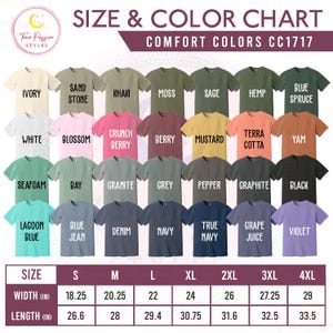May include: A size and colour chart for Comfort Colors CC1717 t-shirts. The chart displays various shirt colours, including Ivory, White, and Black, with sizes ranging from S to 4XL. Width measurements range from 46.35 to 73.66 cm, and lengths from 67.56 to 85.09 cm.