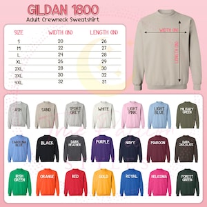 May include: A Gildan 1800 adult crewneck sweatshirt in various colours, including ash, black, and navy. The image displays a size chart with measurements in inches, ranging from S to 4XL. The sweatshirt is shown in a neutral beige colour.