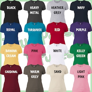 May include: A collage of 16 different colored t-shirts with various text printed on them. The colors include black, navy, royal blue, turquoise, red, purple, banana cream, pink, white, kelly green, cardinal, warm grey, sand, and light pink. The text includes "Black", "Heavy Metal", "Heather Grey", "Navy", "Royal", "Turquoise", "Red", "Purple", "Banana Cream", "Pink", "White", "Kelly Green", "Cardinal", "Warm Grey", "Sand", and "Light Pink".