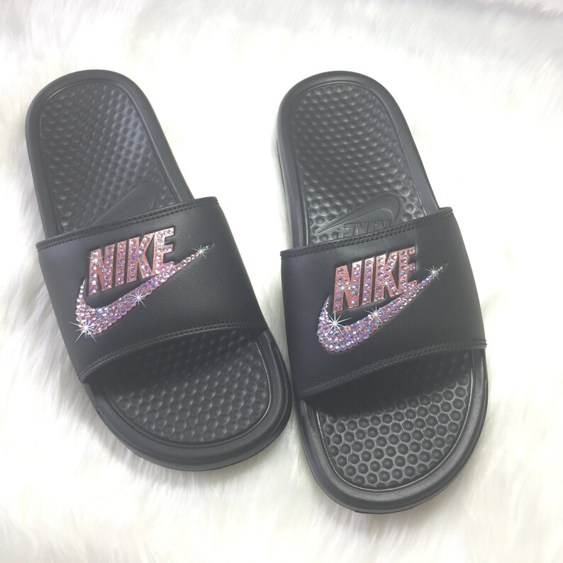 black and rose gold nike slides