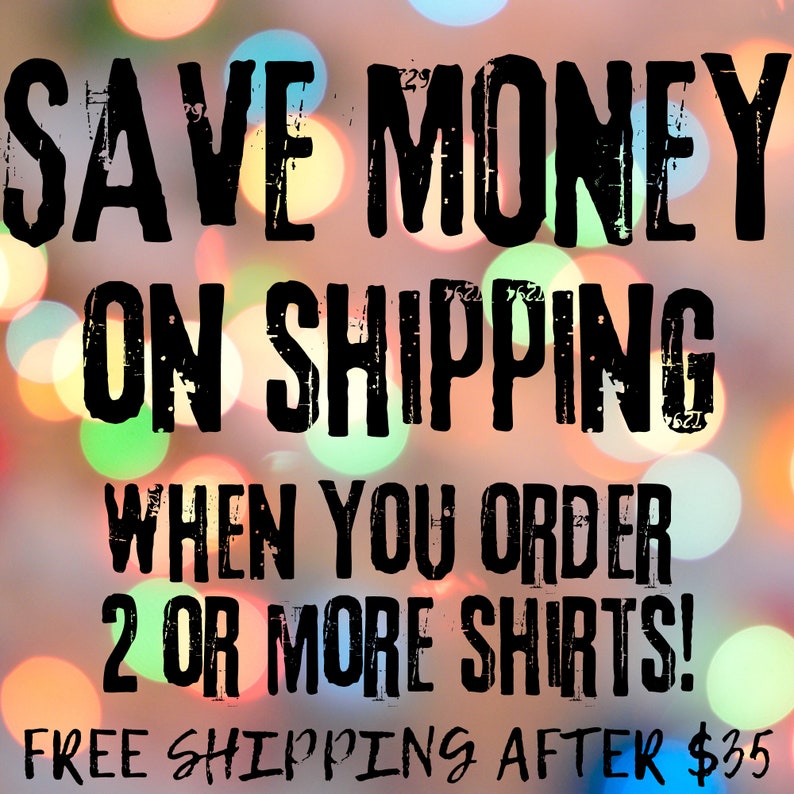 May include: Black text on a blurred background with colorful bokeh lights. The text reads "SAVE MONEY ON SHIPPING WHEN YOU ORDER 2 OR MORE SHIRTS!" The text "FREE SHIPPING AFTER $35" is also visible.