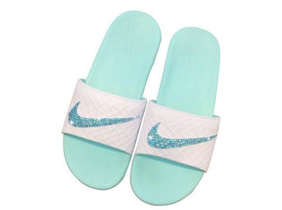 turquoise nike slides