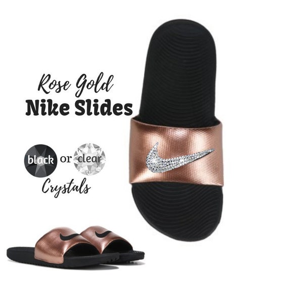 black and rose gold nike sliders