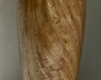 This is a Pecan vase with Turquoise Inlay, it is 10 1/2” tall by 3 3/4” wide