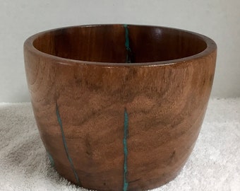 This is a Mesquite utility bowl, with Turquoise Inlay, it is 4 5/8” tall by 6 1/2” wide