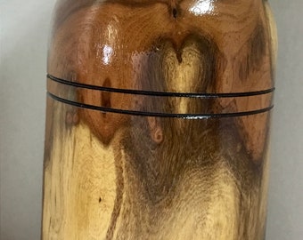This is a piece of Mesquite with Turquoise Inlay, it is 14 1/2” tall by 7 1/4” wide