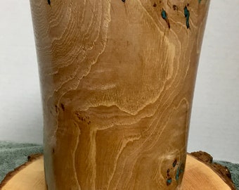 This is a Pecan Wood vase with Turquoise Inlay, it is 8 1/2” tall by 4 5/8” wide