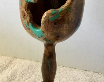 This is an Oak long stemmed goblet, with Turquoise Inlay, it is 9 1/4” high by 3 1/2” wide