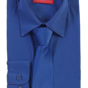 May include: A royal blue dress shirt with a matching tie. The shirt has a button-down collar and long sleeves. The label on the shirt reads "AFT COLLECTION".