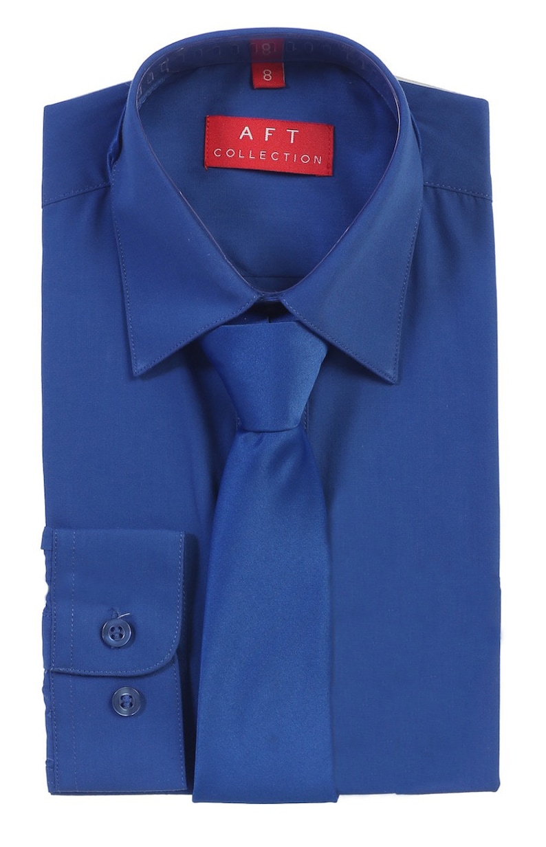 May include: A royal blue dress shirt with a matching tie. The shirt has a button-down collar and long sleeves. The label on the shirt reads "AFT COLLECTION".