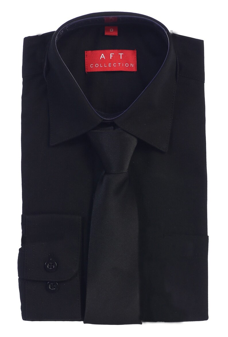 May include: A black dress shirt with a matching black tie. The shirt has a red label with the text "AFT COLLECTION".