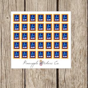 May include: A sheet of 36 stickers featuring the ALDI logo. The stickers are square and have a blue and white logo on a yellow background. The text "Pineapple Stickers Co." is printed at the bottom of the sheet.