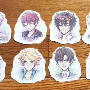 May include: Set of eight watercolor stickers featuring anime-style characters with different hair colors and styles. The stickers are on a light brown wooden surface.
