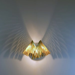 Angel wings store wall light