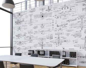 May include: A large wall mural featuring a repeating pattern of black and white technical airplane blueprints. The design displays various aircraft schematics, including top, side, and front views, with detailed lines and annotations on a white background.