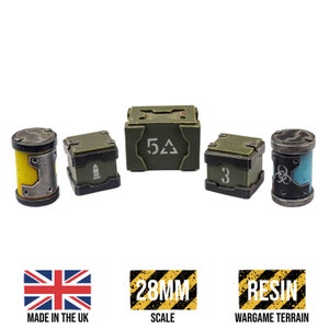 May include: Set of five 28mm scale resin wargame terrain pieces. The set includes three green crates with different markings, a yellow and silver cylinder, and a blue and silver cylinder with a biohazard symbol.