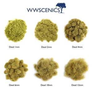 May include: Six piles of different sizes of dead grass flock, ranging from 1mm to 12mm. The grass is a light brown color. The piles are arranged in two rows of three. The text "WWSCENICS" is at the top of the image.