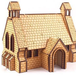 May include: A wooden model kit of a small church with a brown stained finish. The church has a pointed roof, two bell towers, and a large arched doorway.