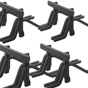 May include: Four black plastic construction supports are arranged in a grid pattern. Each support has a rectangular top section with curved legs and a horizontal extension. The supports are designed for structural use.