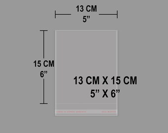May include: A clear rectangular plastic bag with an adhesive strip at the bottom. The bag measures 5 inches by 6 inches. Text on the adhesive strip reads: LINER TO EXPOSE ADHESIVE SEAL MASTER. The dimensions 13 CM 5 inches and 15 CM 6 inches are shown.