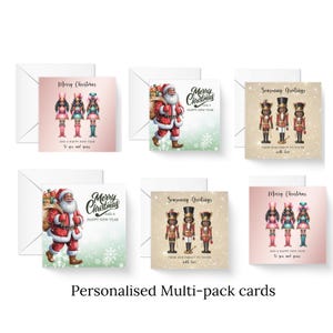 May include: A collection of Christmas cards with various designs. Some cards feature Santa Claus, others show nutcrackers, and some display festive illustrations of toy soldiers. The cards have the text "Merry Christmas" and "Season's Greetings". The text "Personalised Multi-pack cards" is also present.