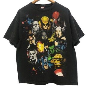 May include: Black t-shirt with a graphic print of various Marvel superheroes, including Spider-Man, Wolverine, Hulk, and Captain America.