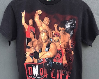 超激レア　新品　nWoメッシュシャツ ジャージ　ウルフパック　WWE Tシャツ il_340x270.1312470054_2j3s.jpg