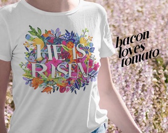 He Is Risen Easter Floral Design - Camiseta de manga corta unisex Jersey