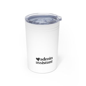May include: White stainless steel travel mug with a black heart and the text "admin assistant" printed on the side.