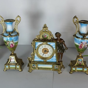 Antique vienna porcelain mantel clock set urns angels cherub putti