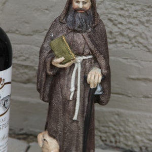 Religious antique statue saint anthony with pig polychrome plaster figurine