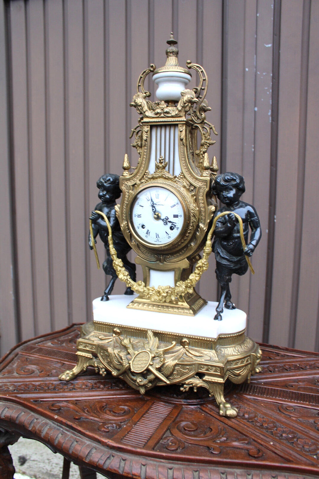 Venta de relojes de bronce y marmol hotsell