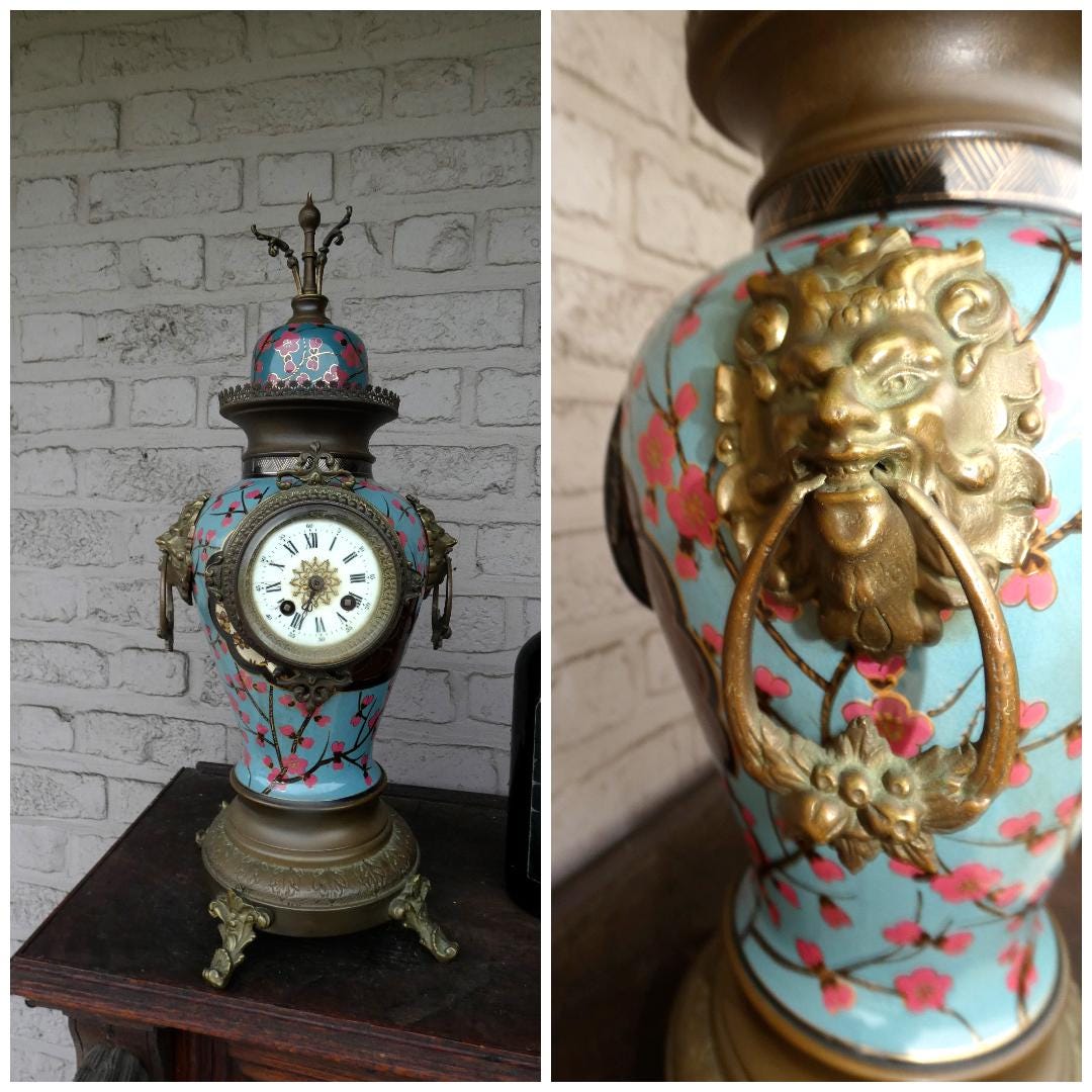 Antique french faience bronze lion heads mantel clock