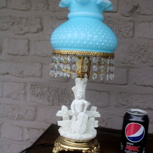 Vintage white porcelain figural lamp turquoise glass shade