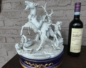 Large Sevres Style Bisque Porcelain Statue: 3 Putti with Buck, Blue Pedestal