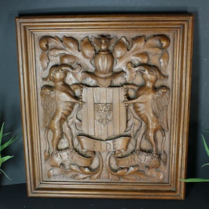 Antique wood carved wall panel coat of arms knight mythological dragons rare
