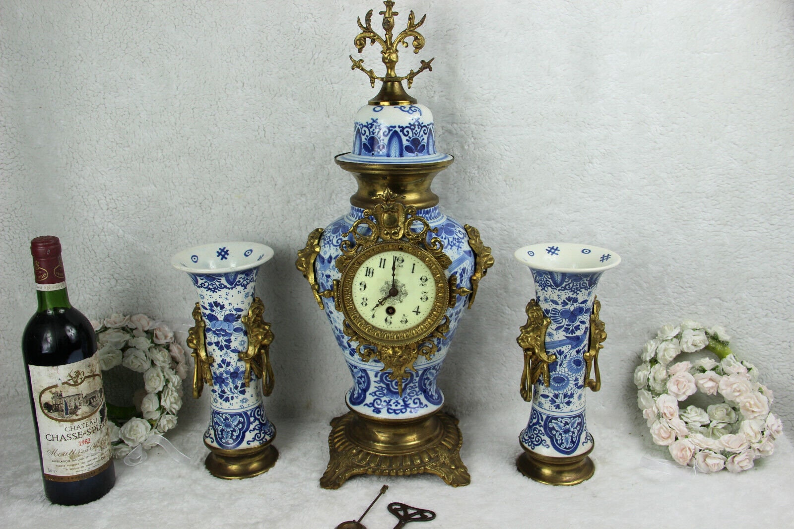 Antique boch delft blue white pottery bird pottery clock vases lion heads mark
