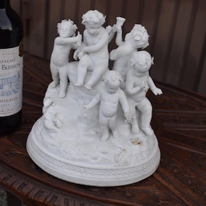 Antique sevres marked bisque porcelain 19thc french bacchus putti grapes statue