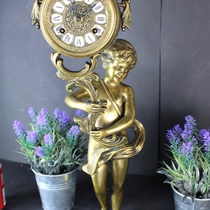 Vintage bronze cherub putti clock figural